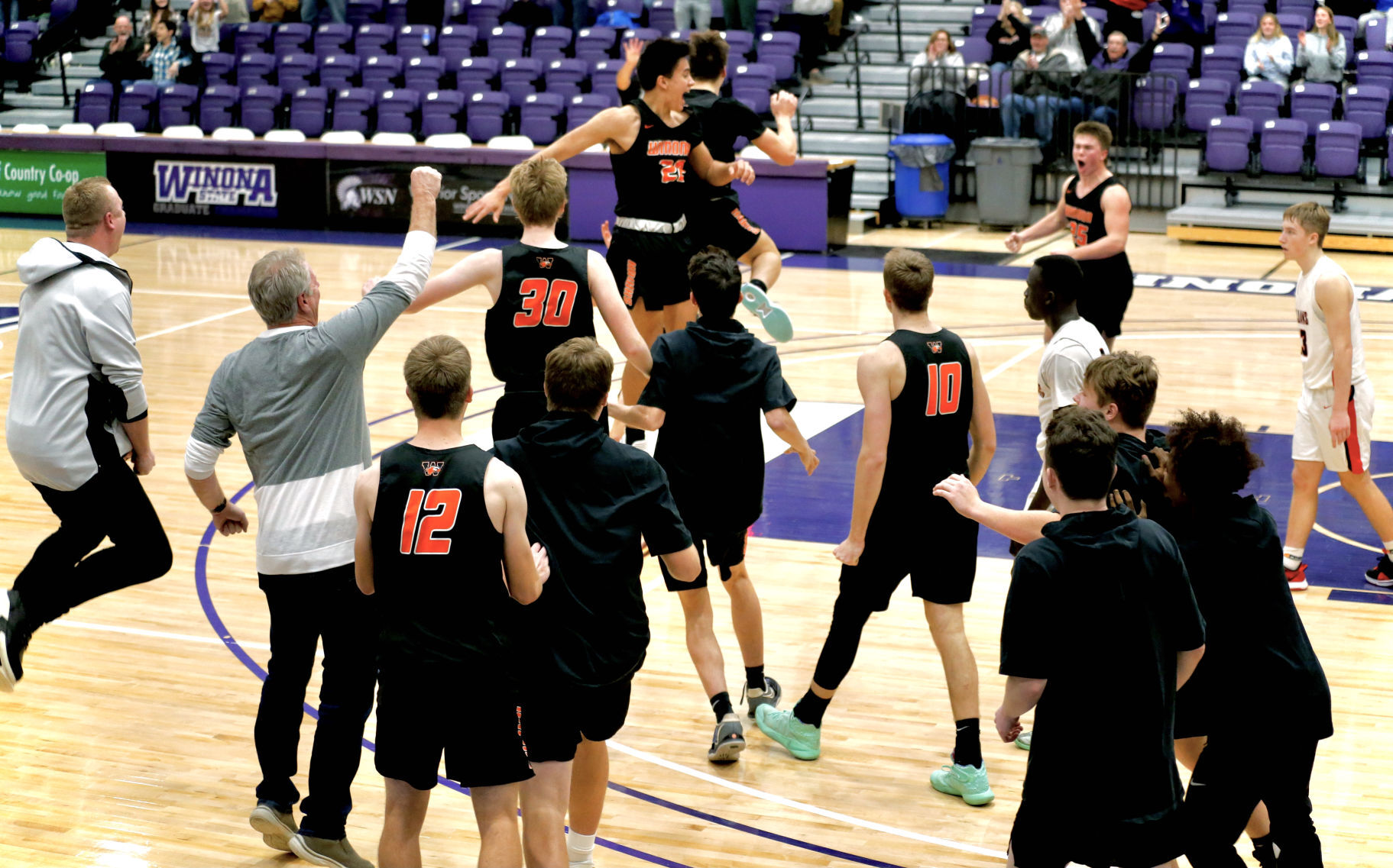 The Winhawks celebrate after a buzzer-beating shot